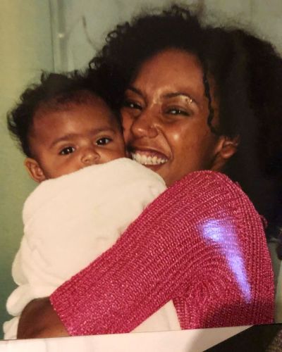 Childhood picture of Phoenix Chi Gulzar with her mother Melanie Brown.